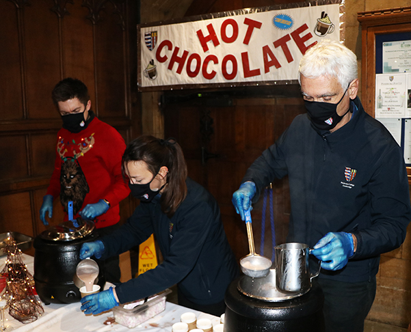 The Catering team serving festive hot chocolate