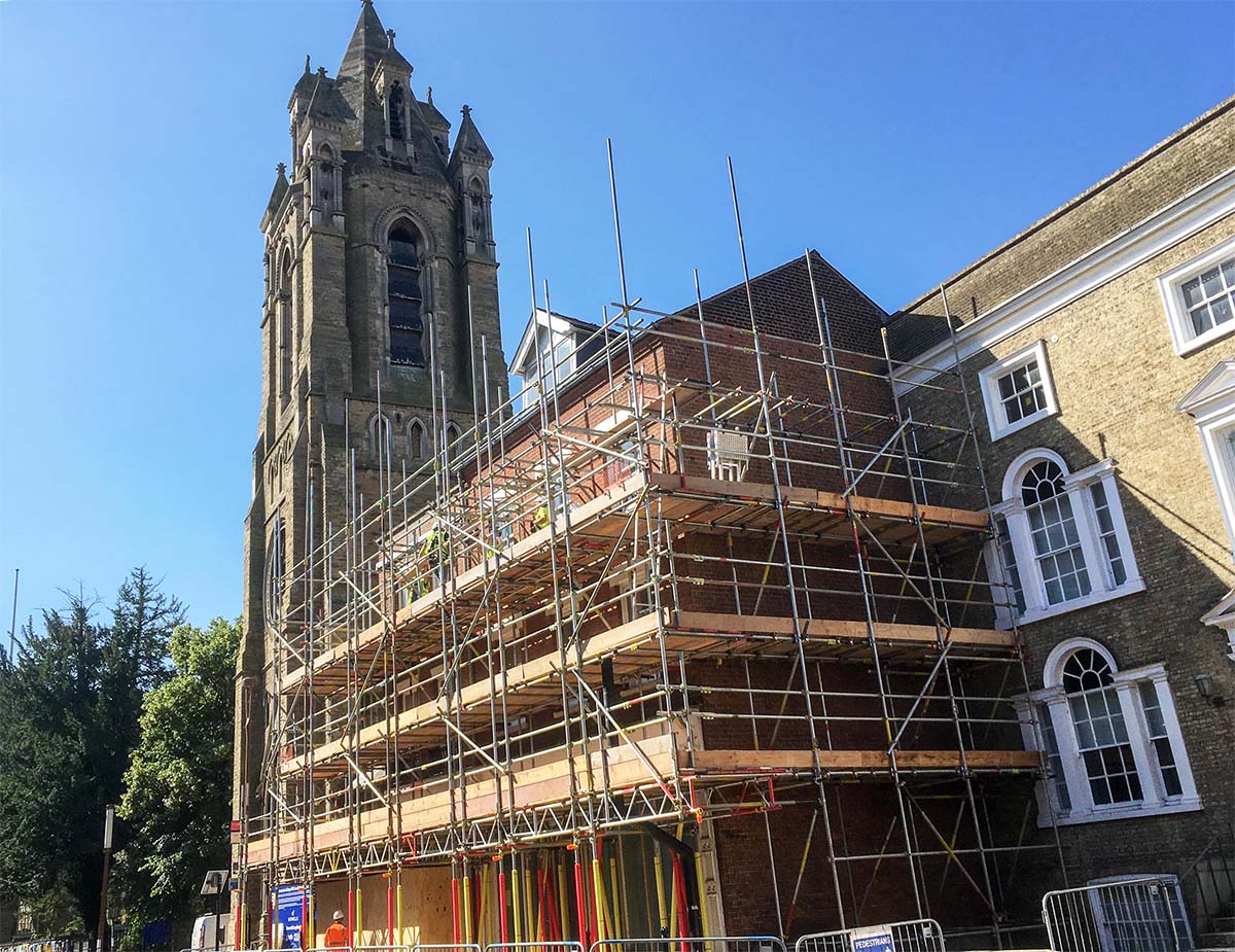 Scaffolding around buildings 75 and 76 Trumpington Street and the foyer of the former Emmanuel United Reformed Church