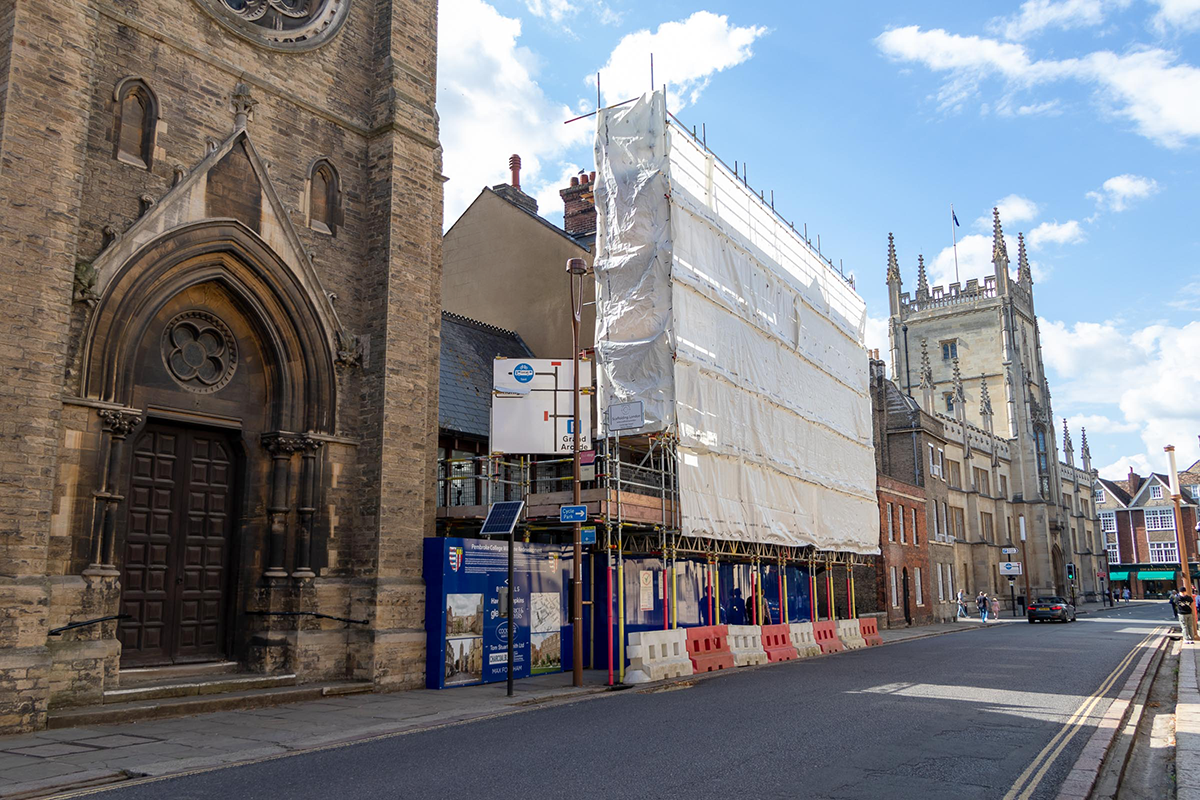 Scaffolding and the hoarding around 75 and 76 Trumpington Street