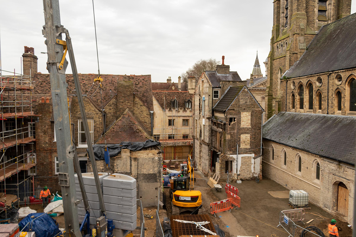 Mill Lane building site, showing demolition of 75 Trumpington Street and Emmanuel URC foyer from rear - December 2021