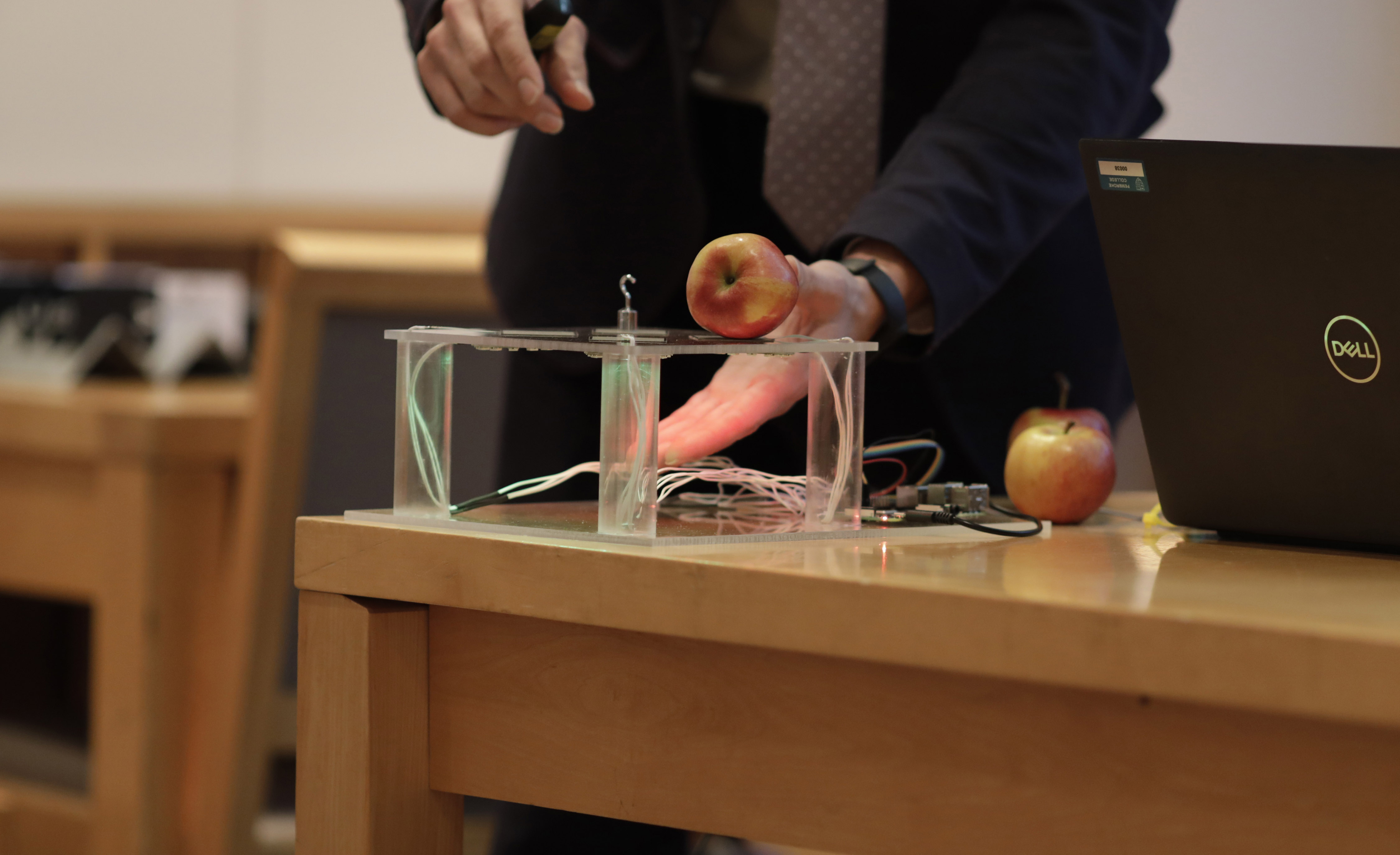 Ivan Grega demonstrates their prototype piezoresistive weight sensors